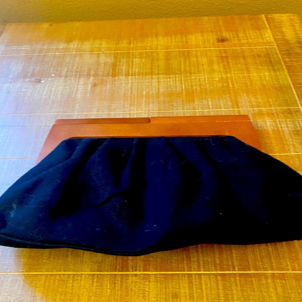 Black clutch with wood handle
